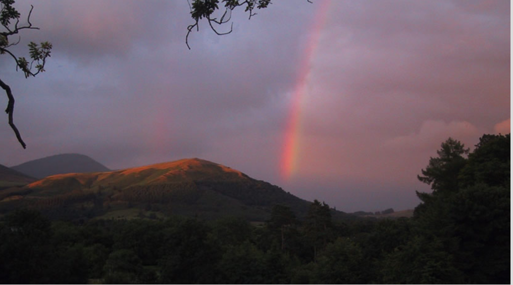 What caused this red-only rainbow?